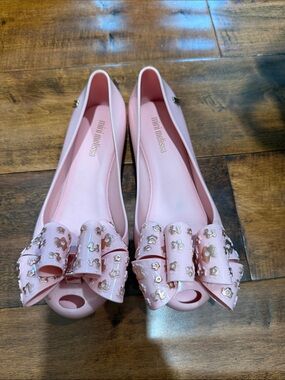 Mini Melissa Light Pink Peep-Toe Flats with Bow and Gold Accents